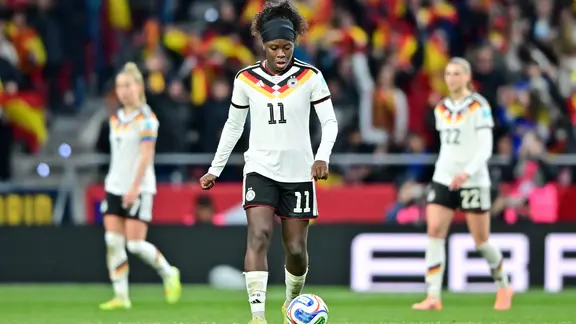 Germany's players react to a goal