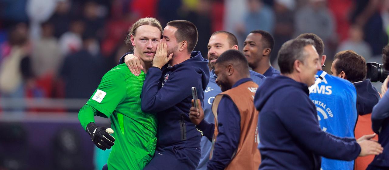 Paris goalkeeper Matvey Safonov is applauded for his penalty save