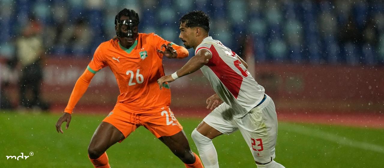 Africa Cup, Ivory Coast - Mozambique, Yan Diomande of Ivory Coast in action against Mozambique's Diogo Calila.