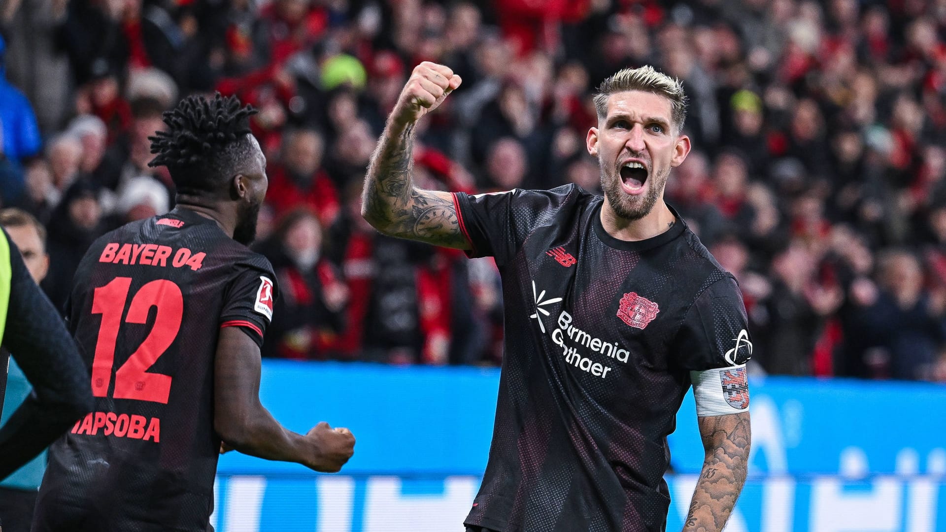 Robert Andrich celebrates: The Leverkusen captain scored in the derby victory.