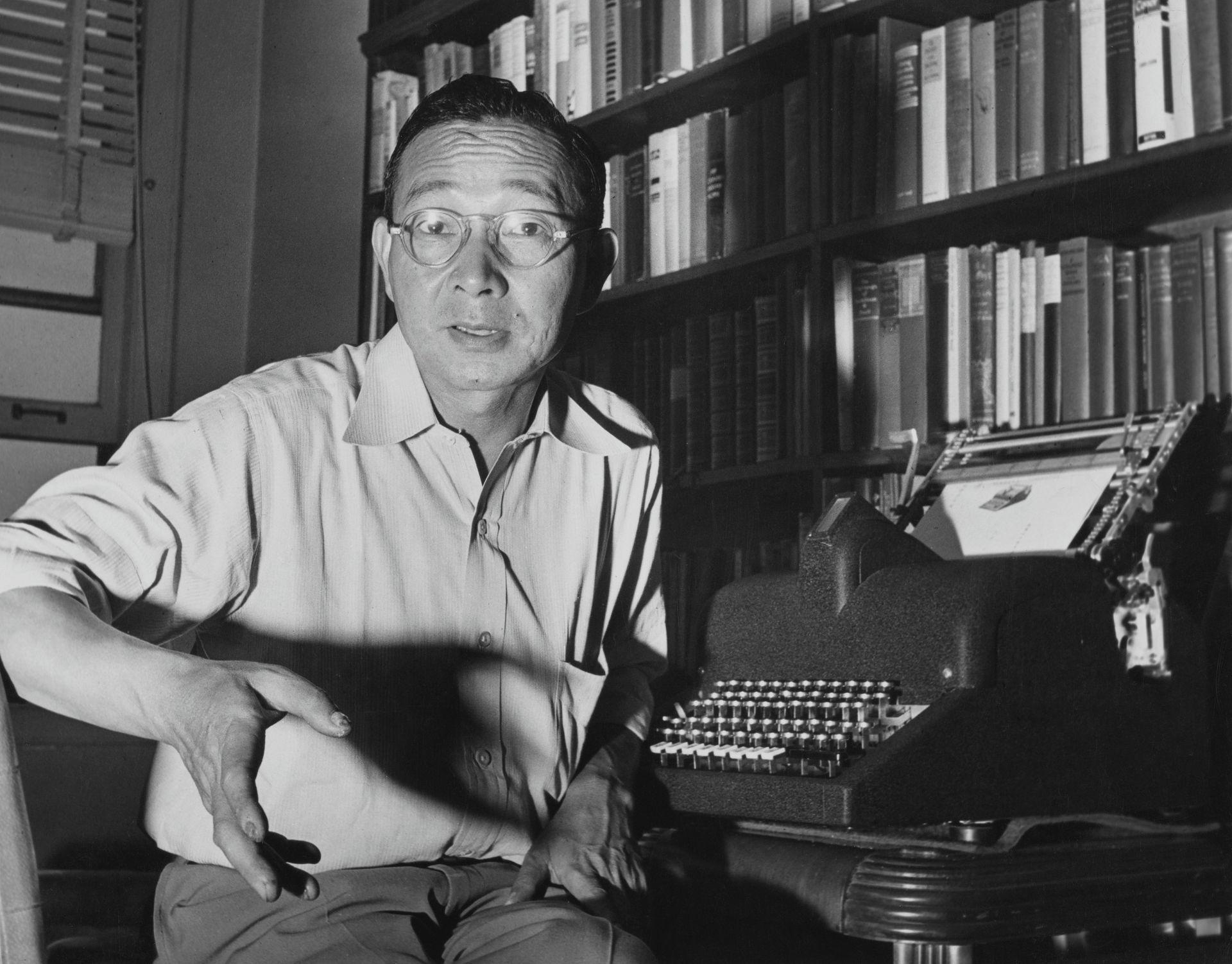 The Chinese writer and linguist Lin Yutang with his typewriter, the MingKwai, which could form ninety thousand Chinese characters, circa 1941.