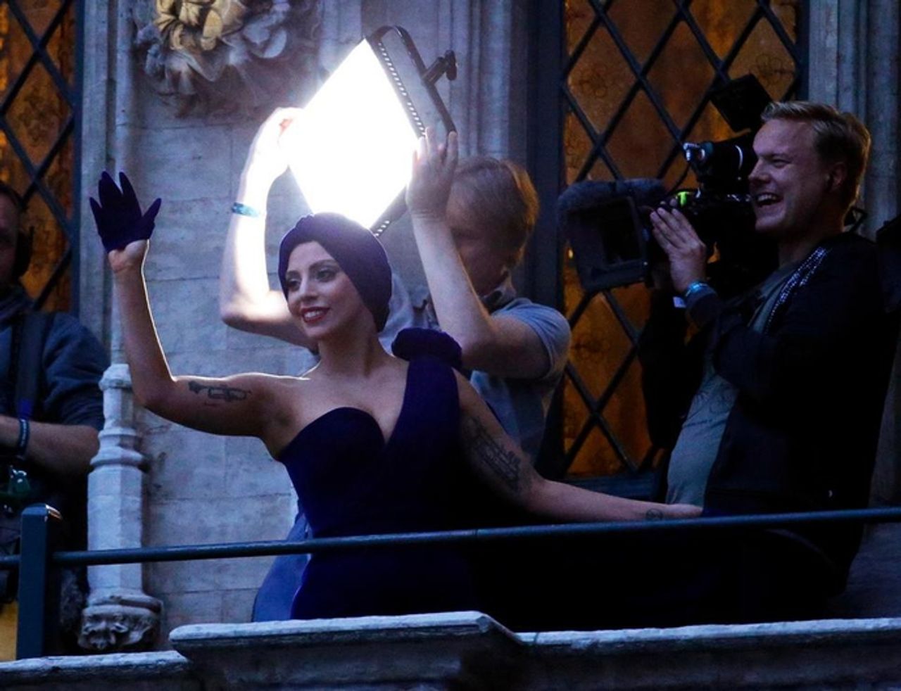 Ruud holds the lamp during a recording with Lady Gaga. 