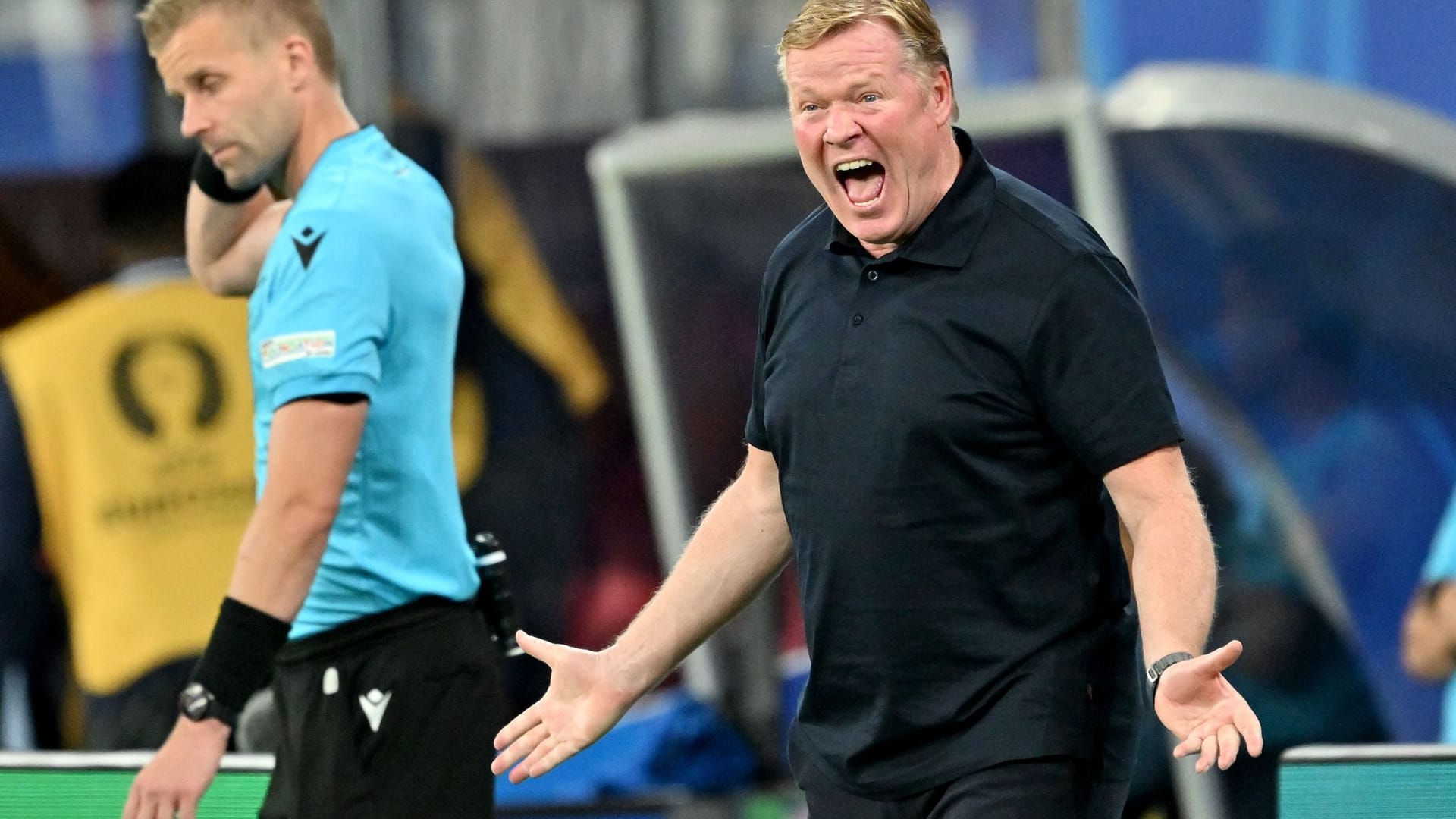 Coach Ronald Koeman from the Netherlands shouts into the field.