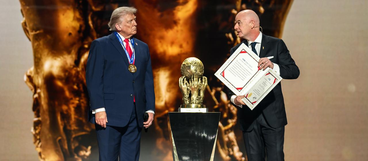 Donald Trump (l.) and Gianni Infantino (r.)