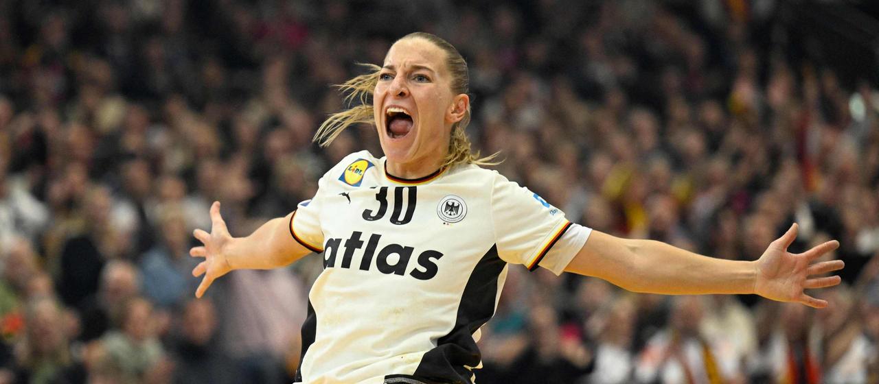 Jenny Behrend celebrates against Montenegro