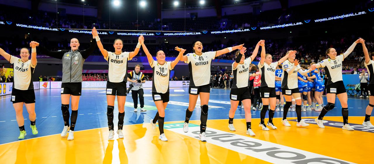 The DHB women celebrate the victory