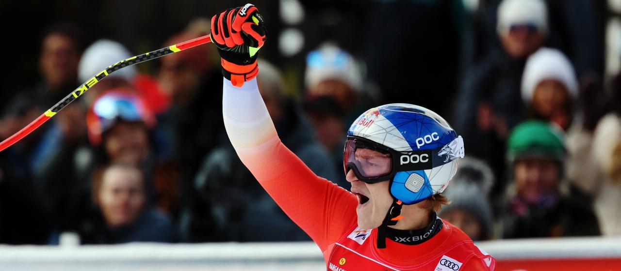 Marco Odermatt celebrates at the finish