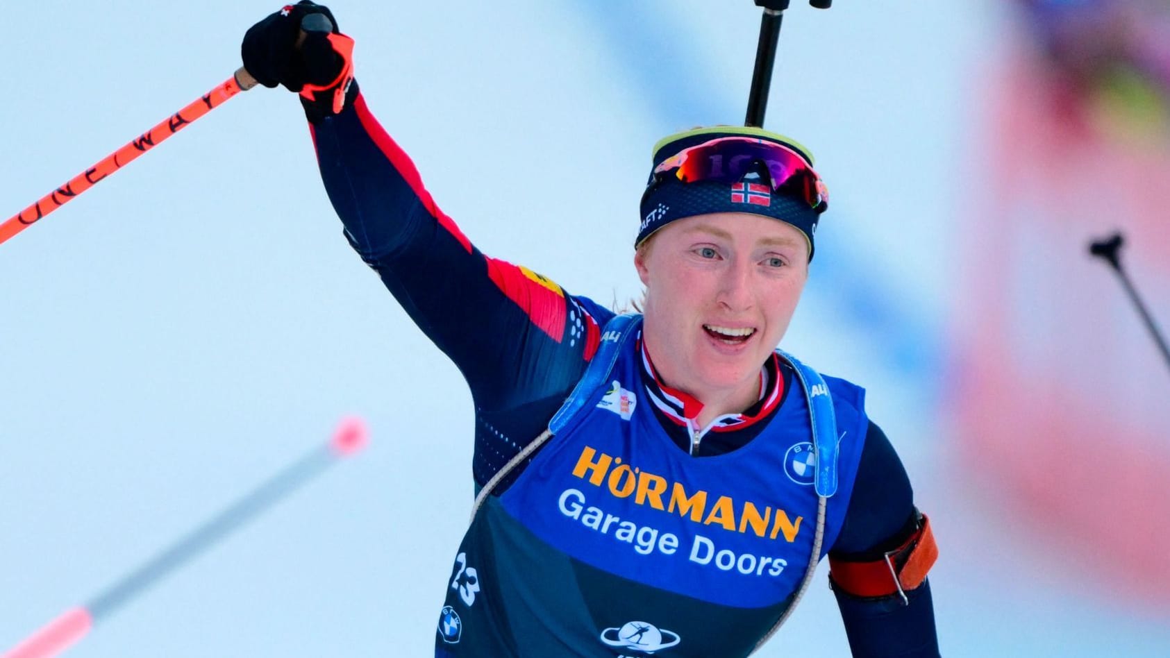 Maren Kirkeeide crosses the finish line: The Norwegian won the women's 12.5 km mass start race on Sunday.