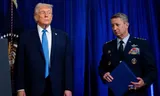 President Donald Trump and Chairman of the Joint Chiefs of Staff John D. Caine at a news conference at the Mar-a-Lago Club in Florida regarding the arrest of Nicolas Maduro.