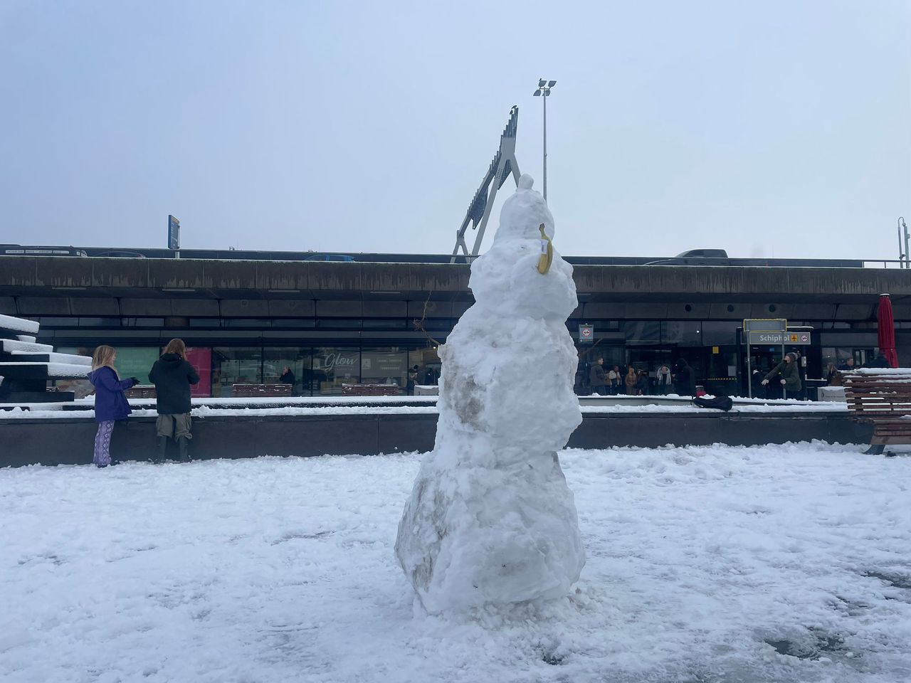 A snowman on the square in front of Schiphol.