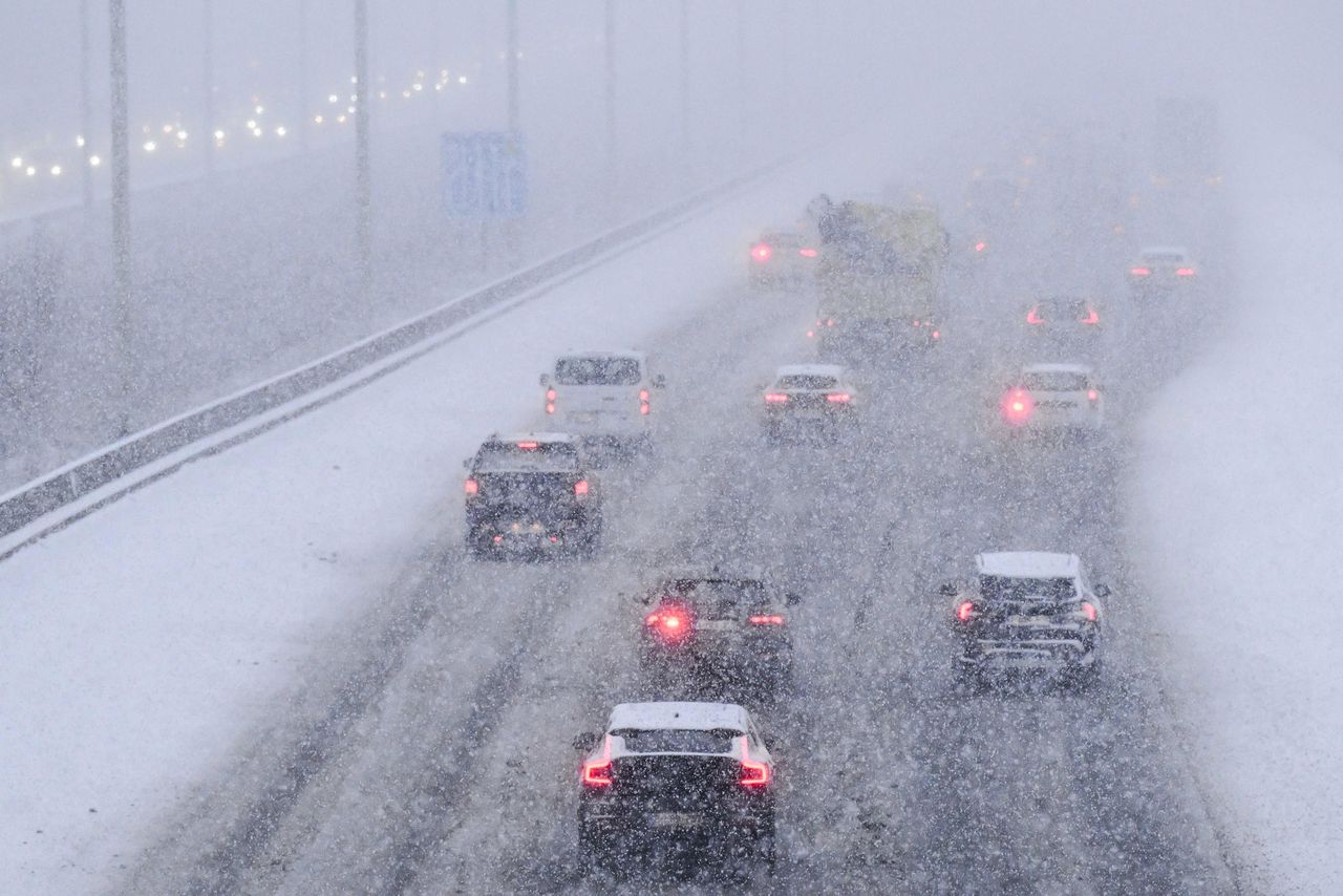 Motorists drive on the highway near Kontich, Belgium.