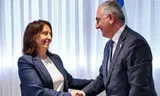Reza Pahlavi, the eldest son of Iran's former Shah, shakes hands with Israeli Intelligence Minister Gila Gamliel during a meeting in Tel Aviv on Wednesday.  