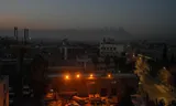 Smoke rises from Aleppo in northern Syria. 