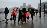Undocumented migrants on their way to the court in Rotterdam. 