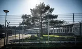 Asylum seekers with applications that are seen as underprivileged stay in the Budel-Cranendonck reception location. They stay within the fences 22 hours a day.