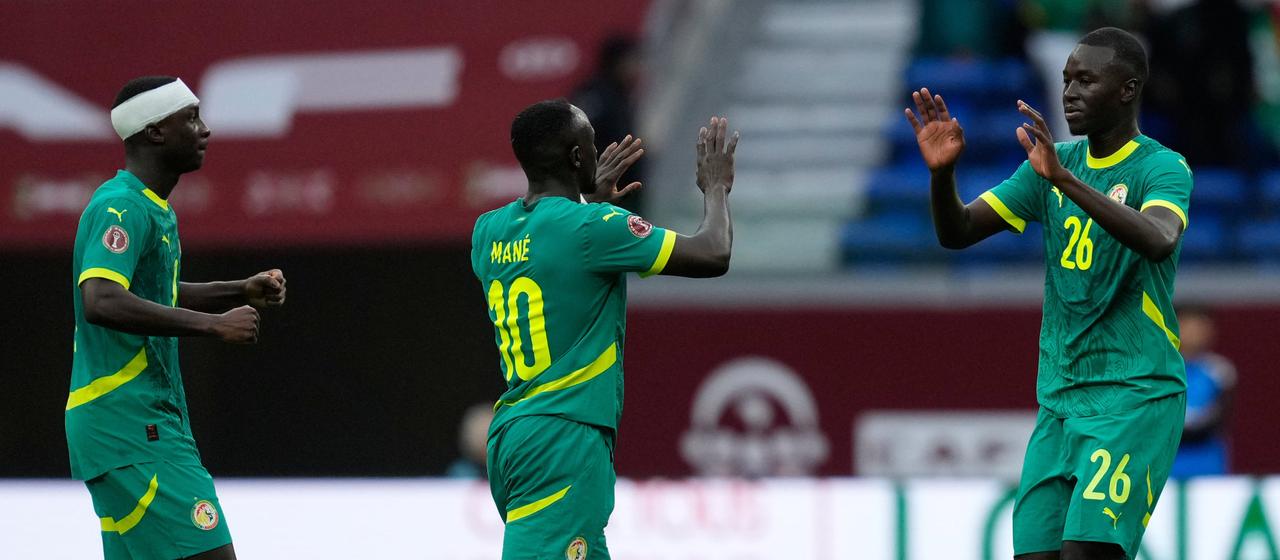 Senegal's players celebrate their goal against Sudan