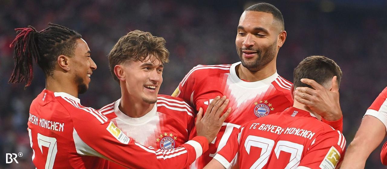 Olise, Bischof, Tah and Guerreiro celebrate after a goal against Wolfsburg