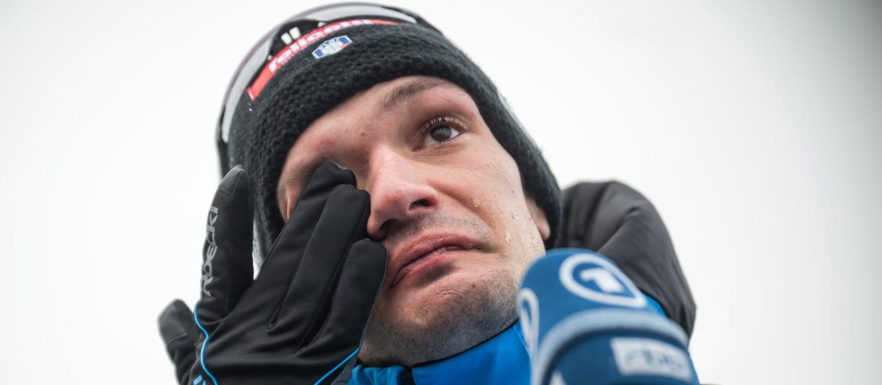 Tommaso Giacomel cries