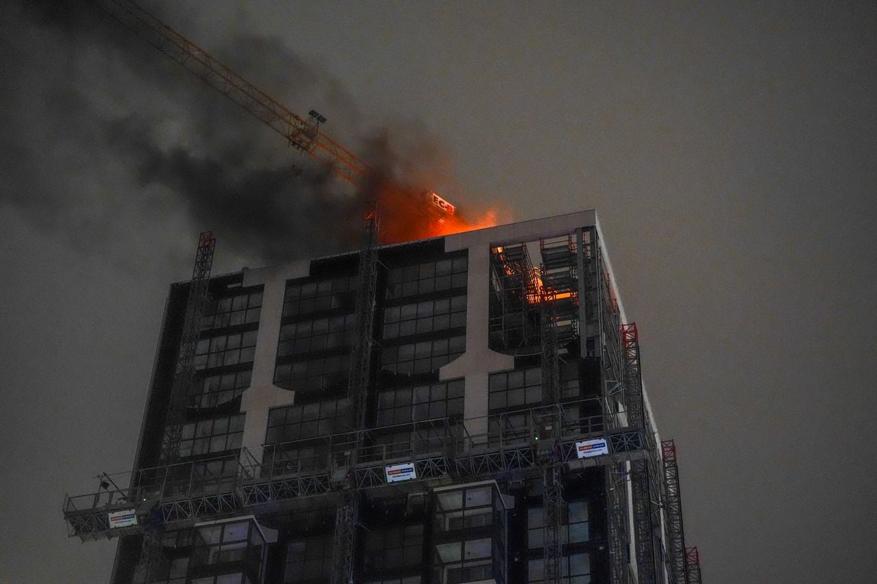 Flames from the roof of the tower (photo: Heitink Press Agency).