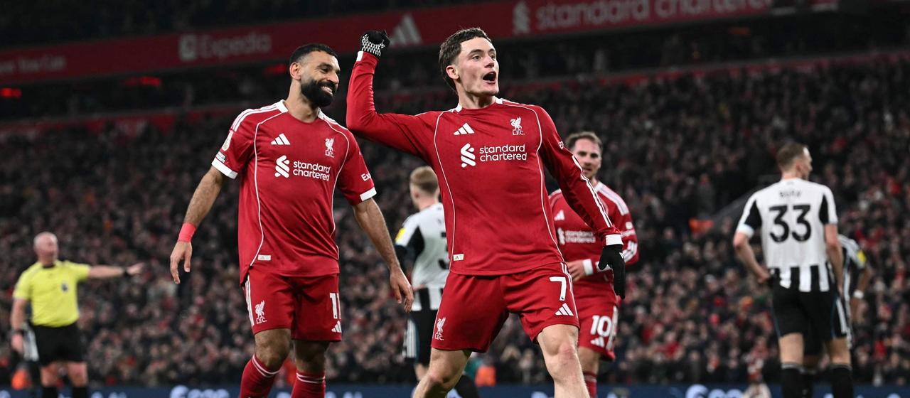 Liverpool's Florian Wirtz celebrates his goal together with Mohamed Salah