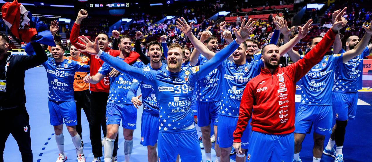 Croatia's handball players cheer