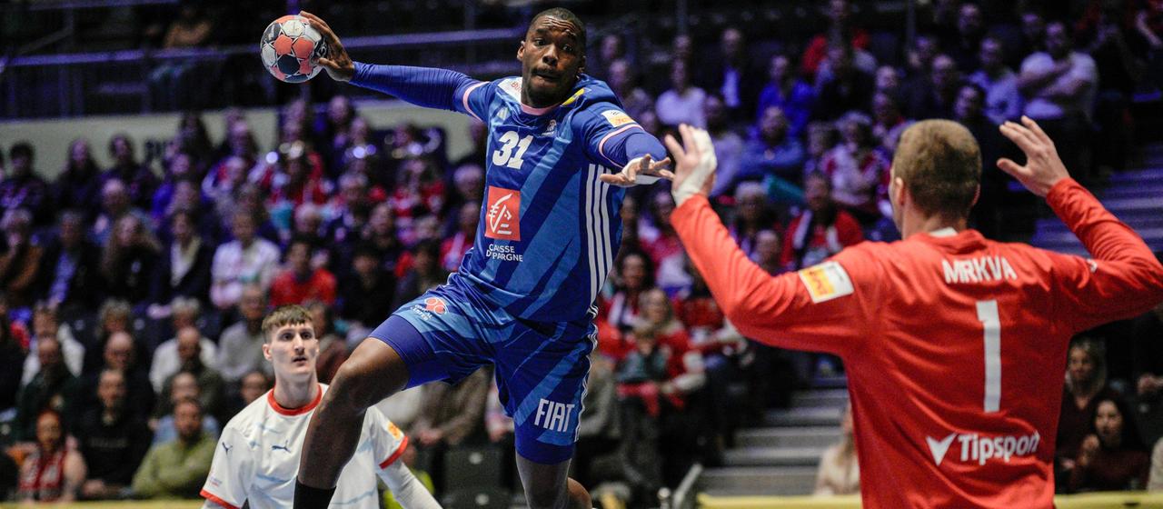 France's Dylan Nahi throws at the goal of Czech Republic's Tomas Mrkva