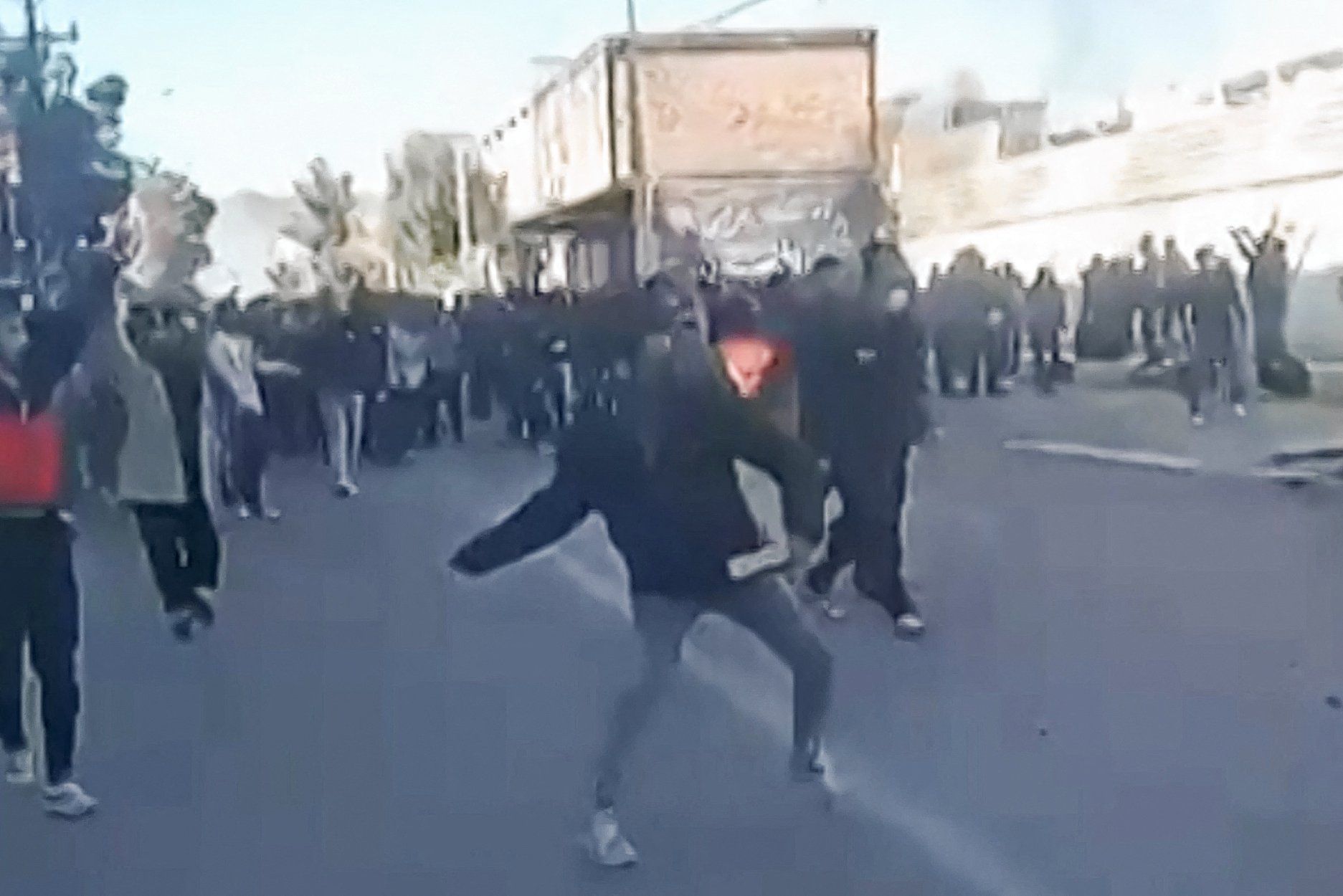 Protesters on December 31 attack a government building in southern Iran