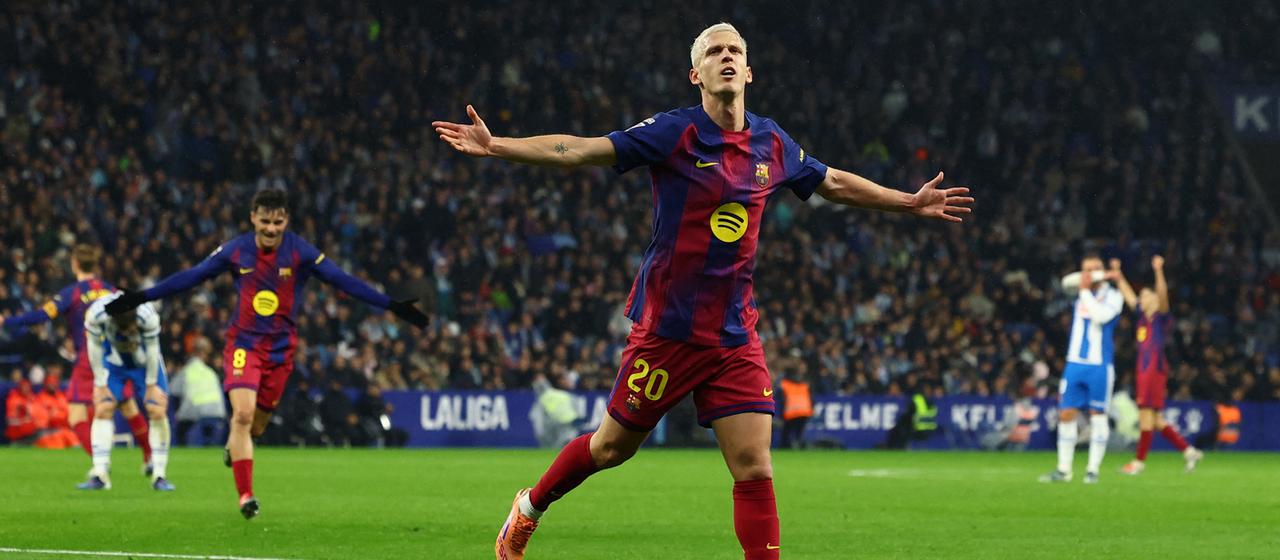 Dani Olmo celebrates his opening goal for Barcelona