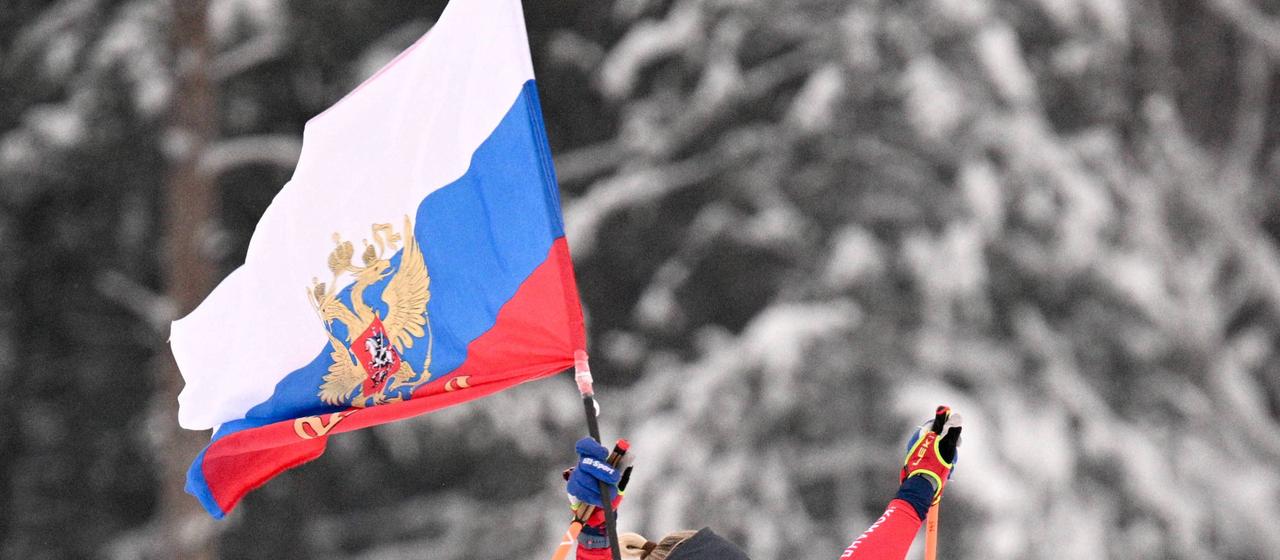 An athlete with a Russian flag