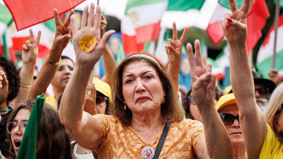 Photogallery A protester participates in a demonstration against the Iranian regime in Brussels. The protest, called by the opposition organization National Council of Resistance of Iran (CNRI)