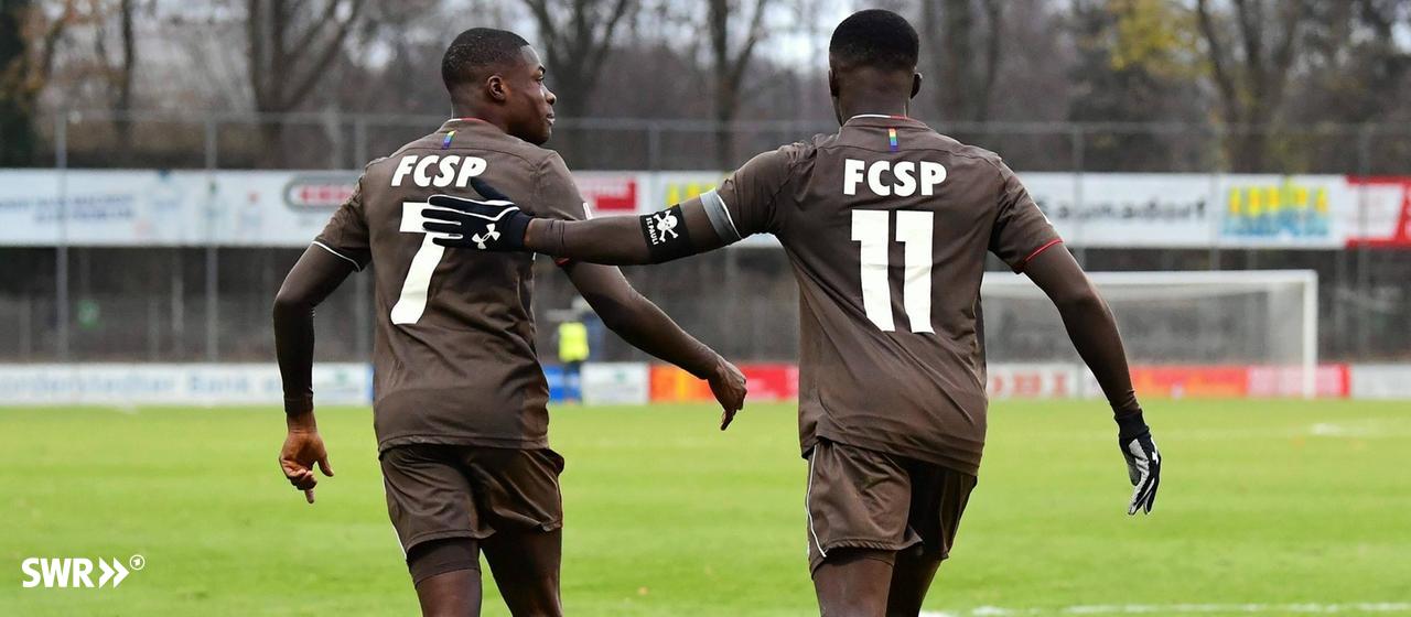 Christian and Sirlord Conteh in the FC St. Pauli jersey