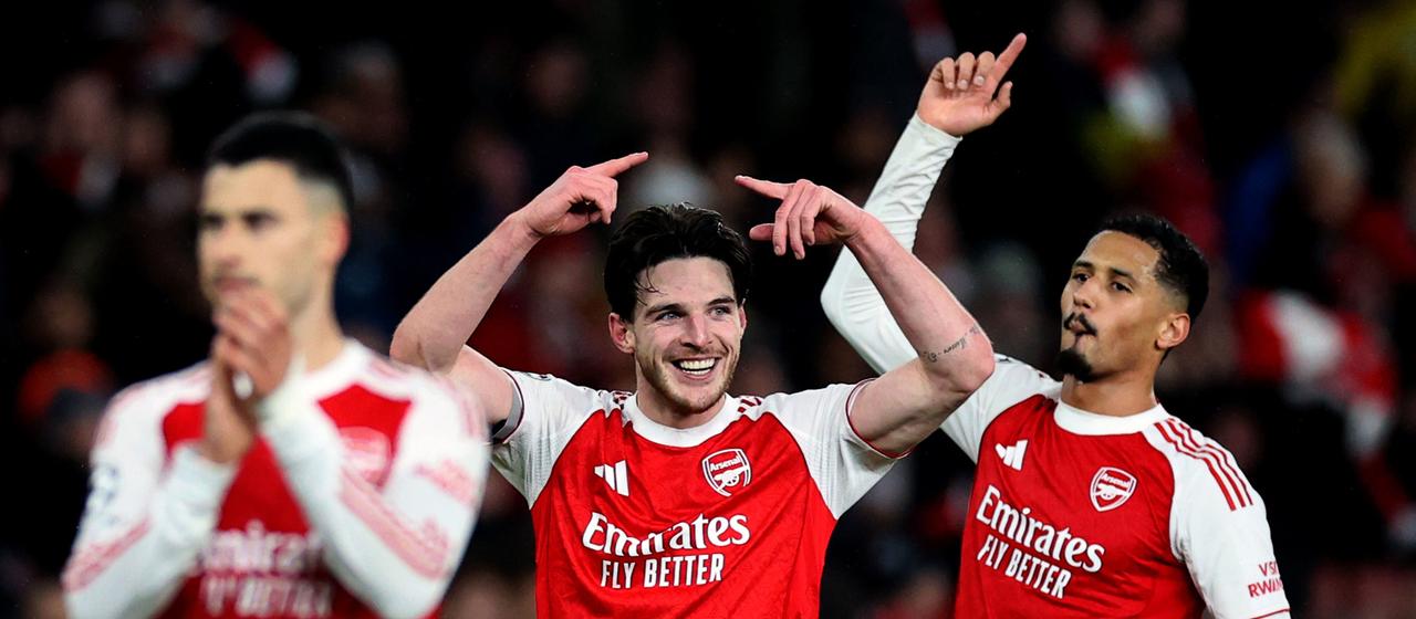 Arsenal FC players celebrate after their win against FC Bayern
