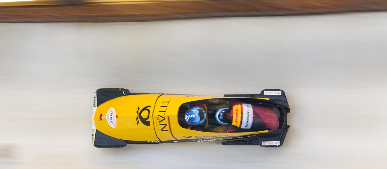 Johannes Lochner and Georg Fleischhauer (Germany) drive down the track