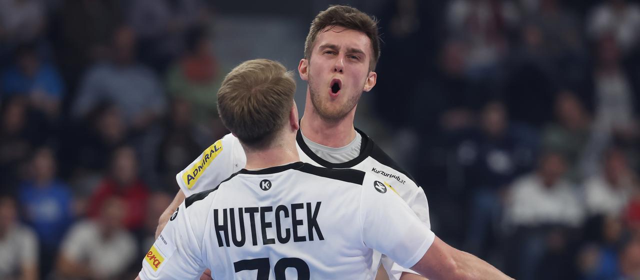 Lukas Hutecek and Nikola Bilyk cheer