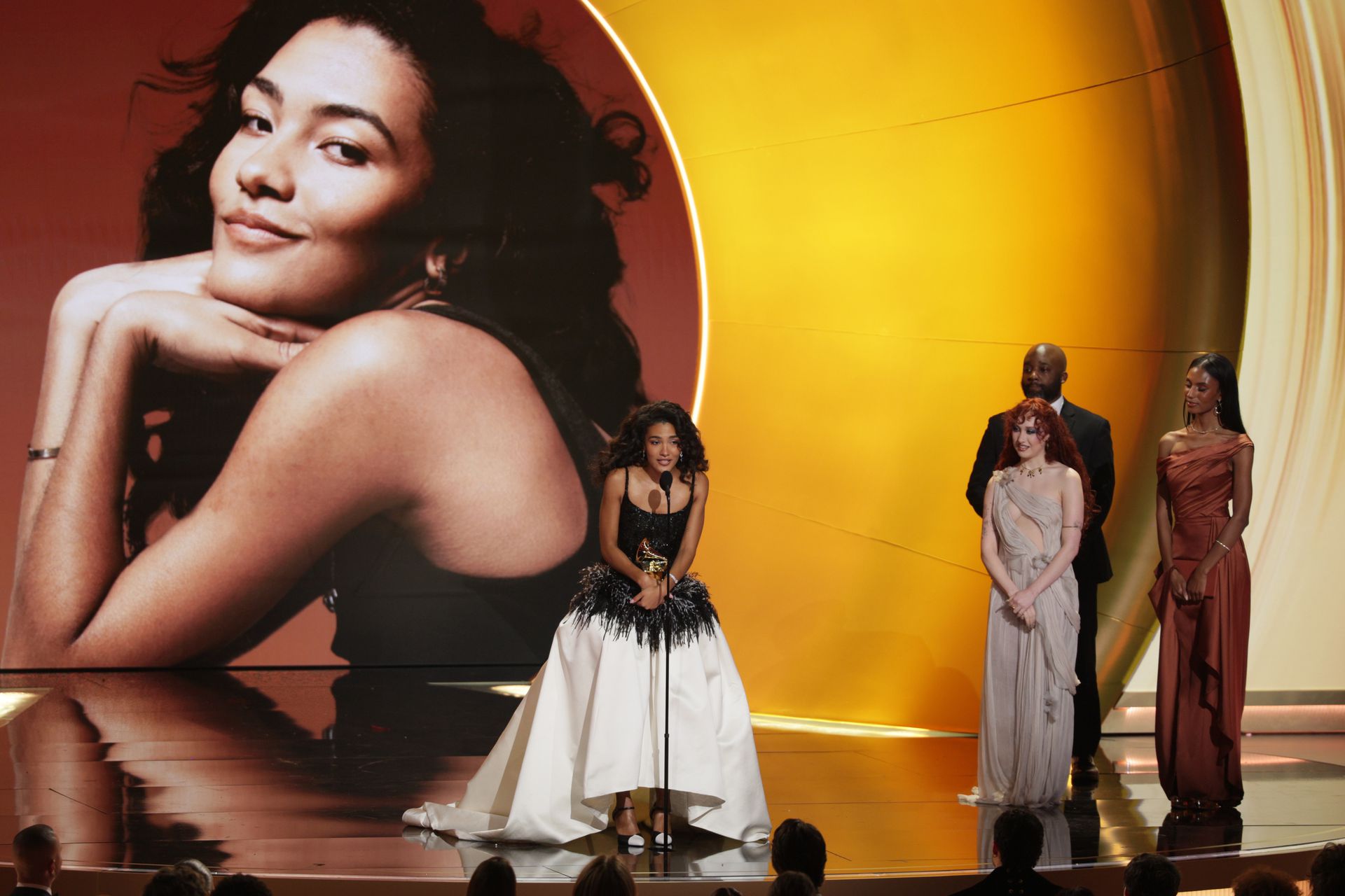 British singer Olivia Dean receives her Grammy for best new artist.