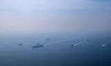 The US aircraft carrier USS Abraham Lincoln leads a battle group during an exercise in the Arabian Sea on February 6, in a photo released by the US Navy.
