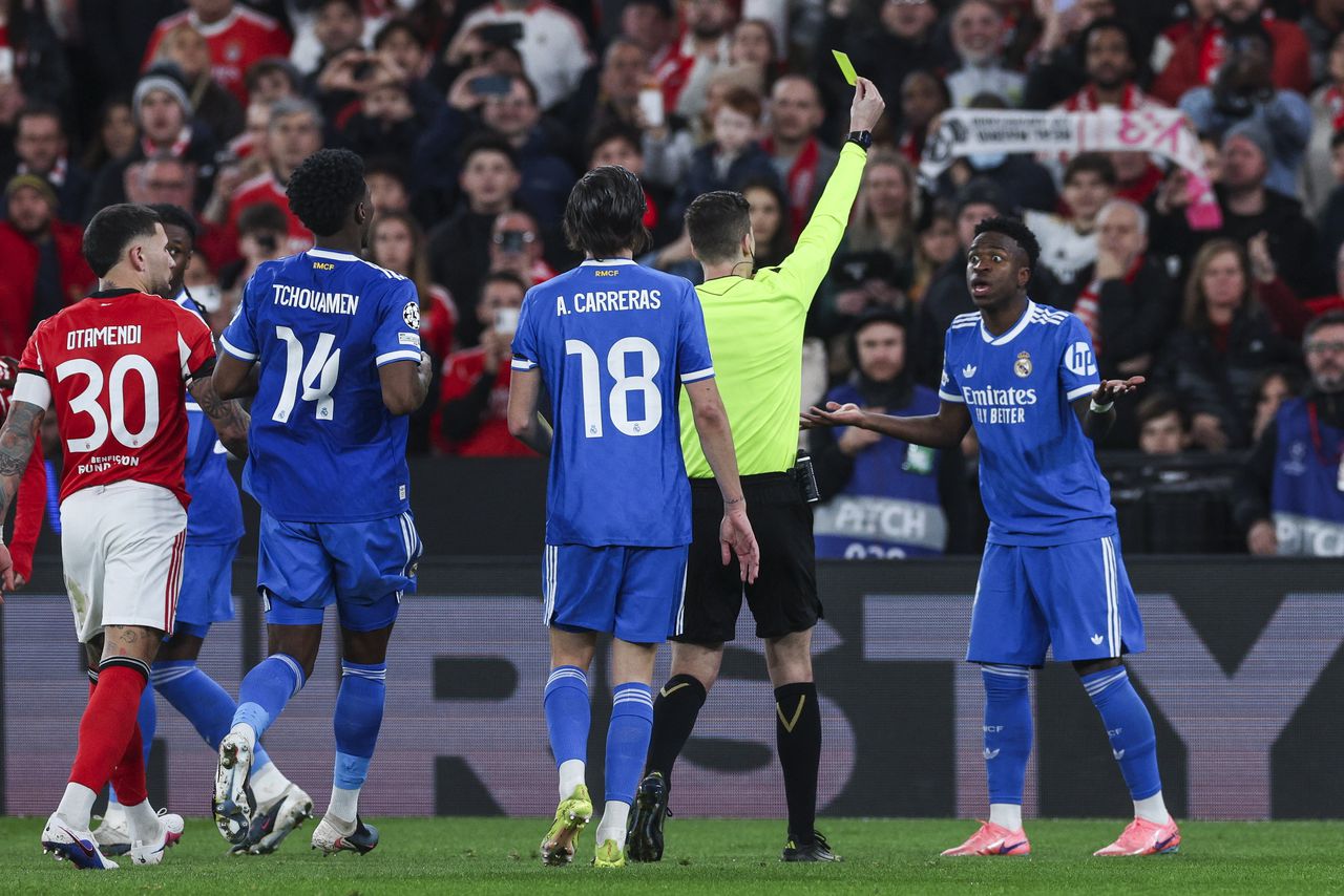 Vinicius Jr then receives a yellow card.