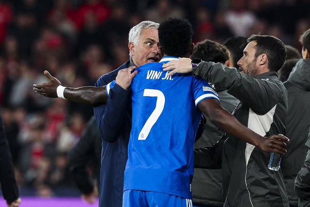 Benfica coach José Mourinho in discussion with Vinicius Jr after the match was stopped due to alleged racism towards the Real Madrid striker. 