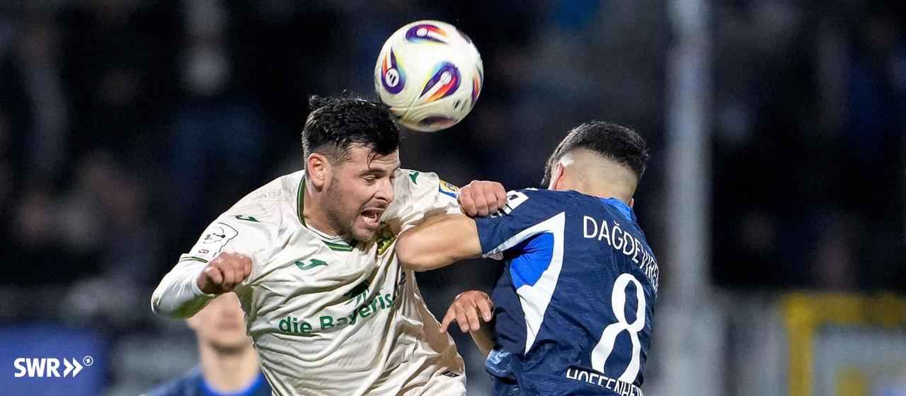 Kevin Volland from 1860 Munich and Diren Dagdeviren from TSG Hoffenheim II in a header duel.