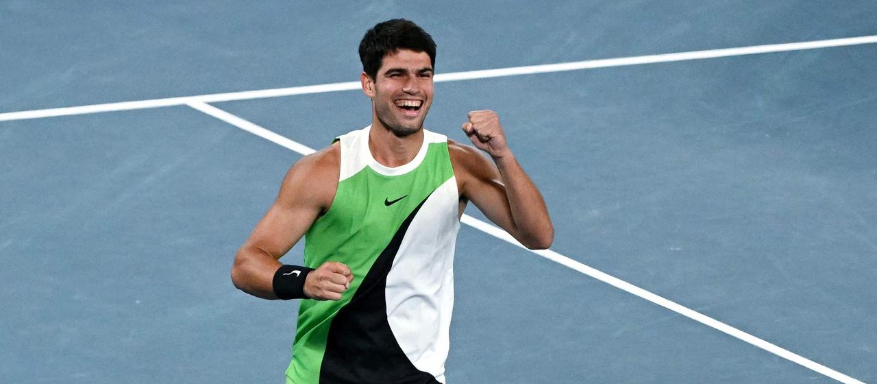 Carlos Alcaraz celebrates winning the Australian Open