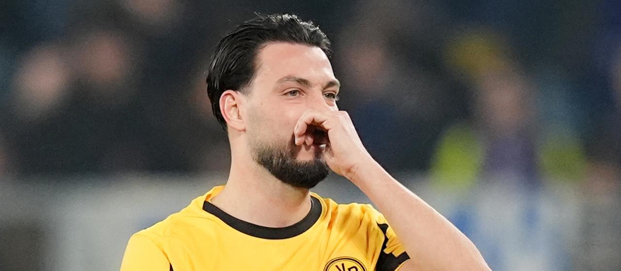Ramy Bensebaini reacts disappointedly