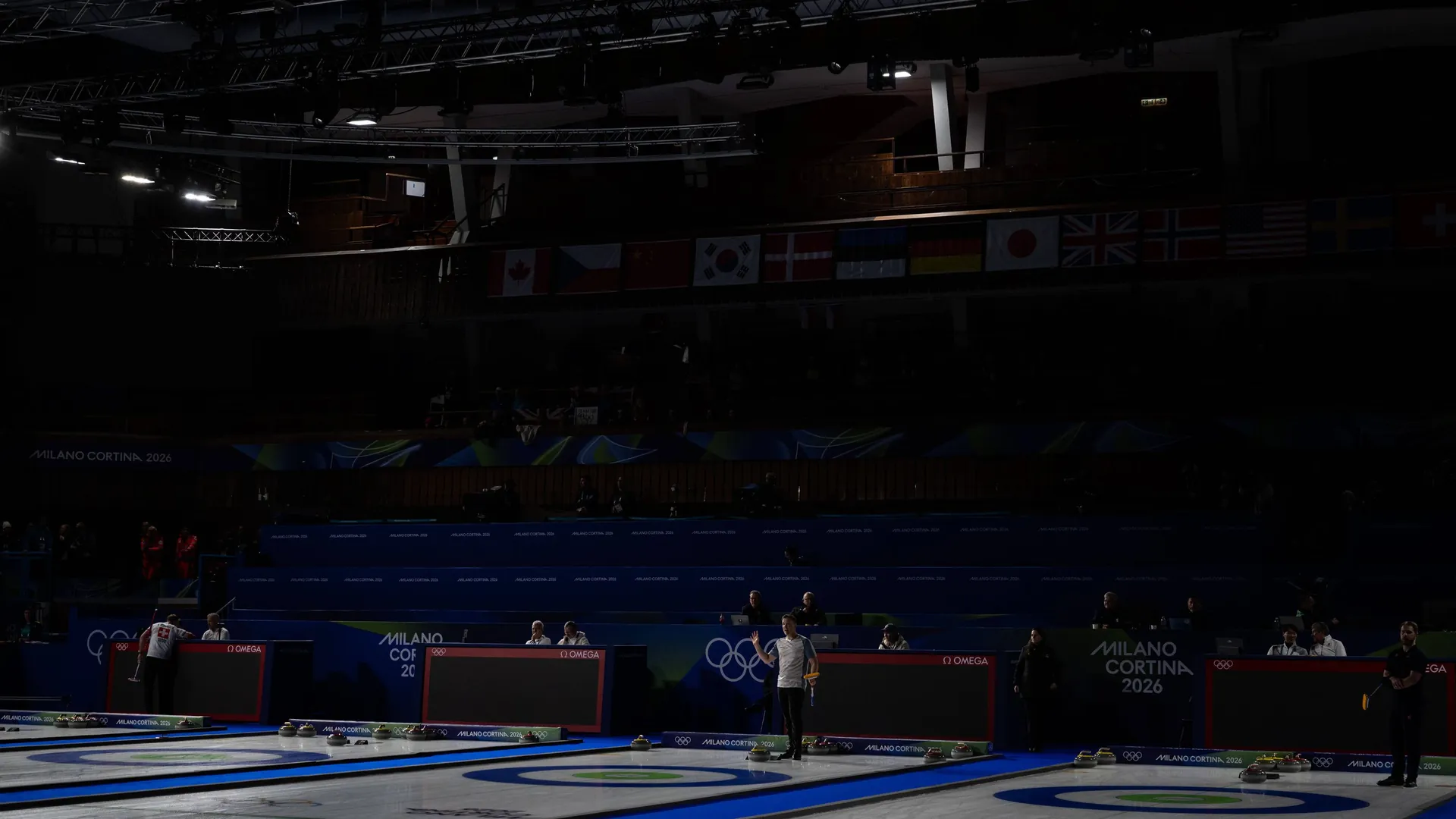 Suddenly it became dark in the Olympic curling hall.