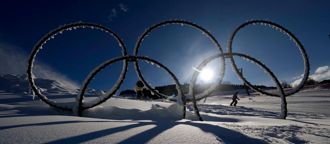 The Olympic rings are seen in the snow at the Stelvio Ski Center, the venue for the alpine skiing and ski mountaineering disciplines at the 2026 Milan-Cortina Winter Olympics.