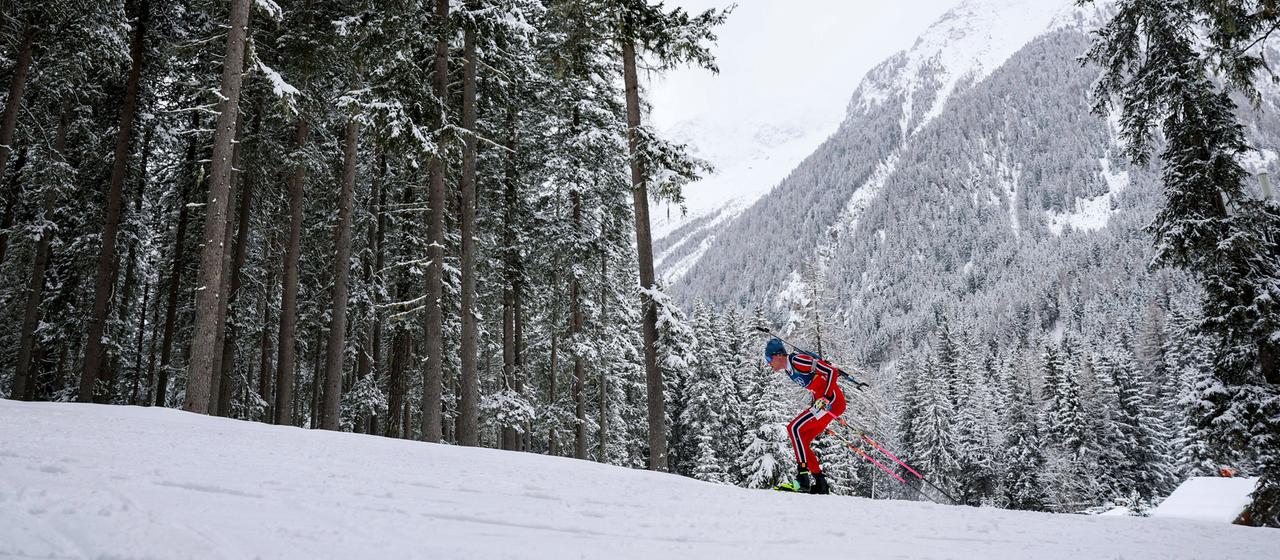 Martin Uldal from Norway takes part in the men's biathlon.