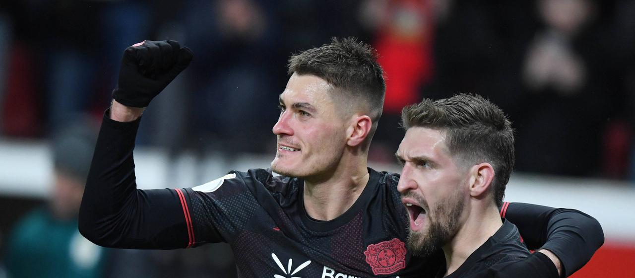 Leverkusen's Patrick Schick celebrates his goal with teammate Robert Andrich