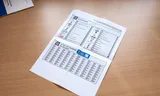 The voter first makes the circle red for the party with the new ballot paper.