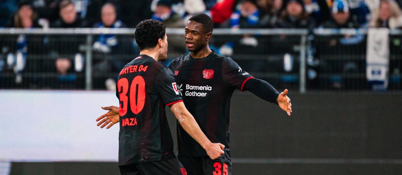 Leverkusen's Christian Kofane (r.) celebrates his goal with Ibrahim Maza