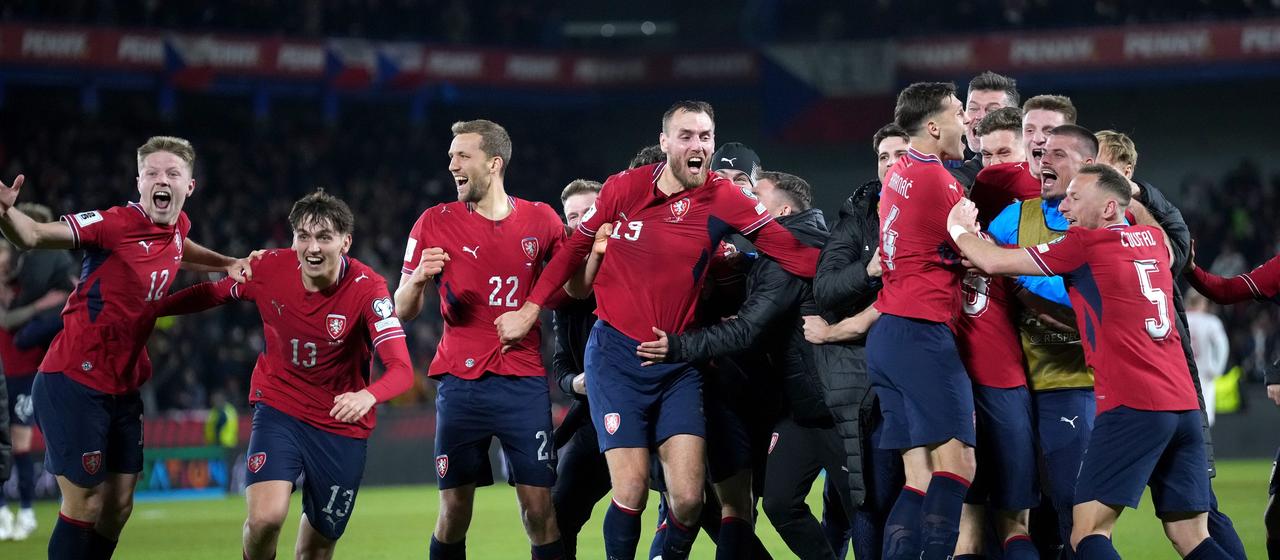 The Czech team celebrates qualifying for the World Cup
