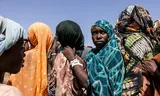 26-year-old Sudanese Soumaina Adam Sein queues up to register at a refugee camp in Chad last November.