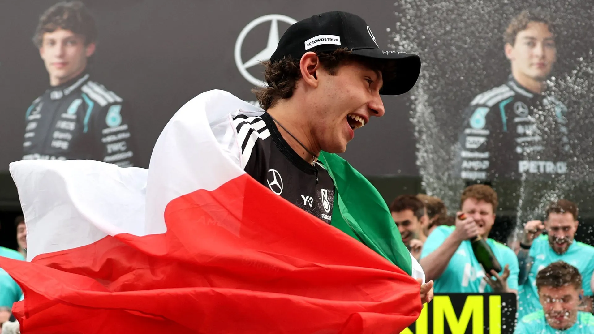 Wrapped in the Italian flag, Kimi Antonelli celebrated his race victory in Japan.